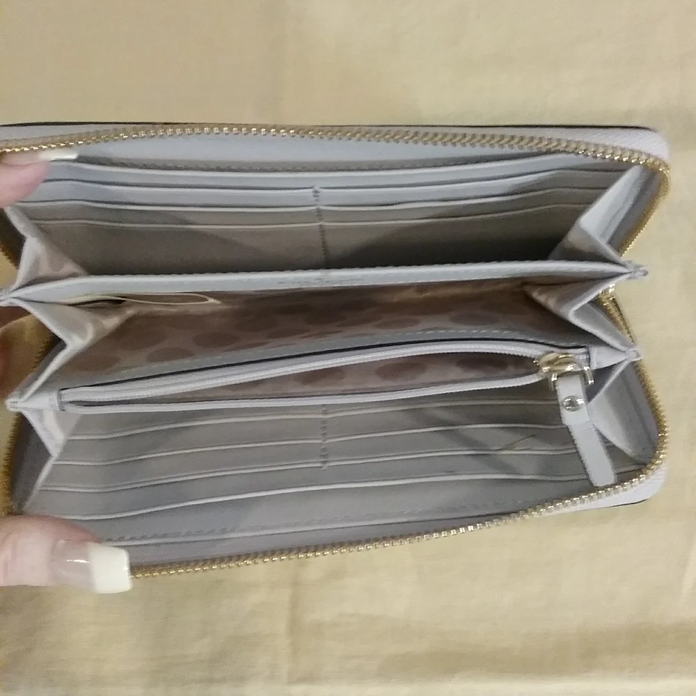 Kate Spade Zippy Liight Purple Wallet